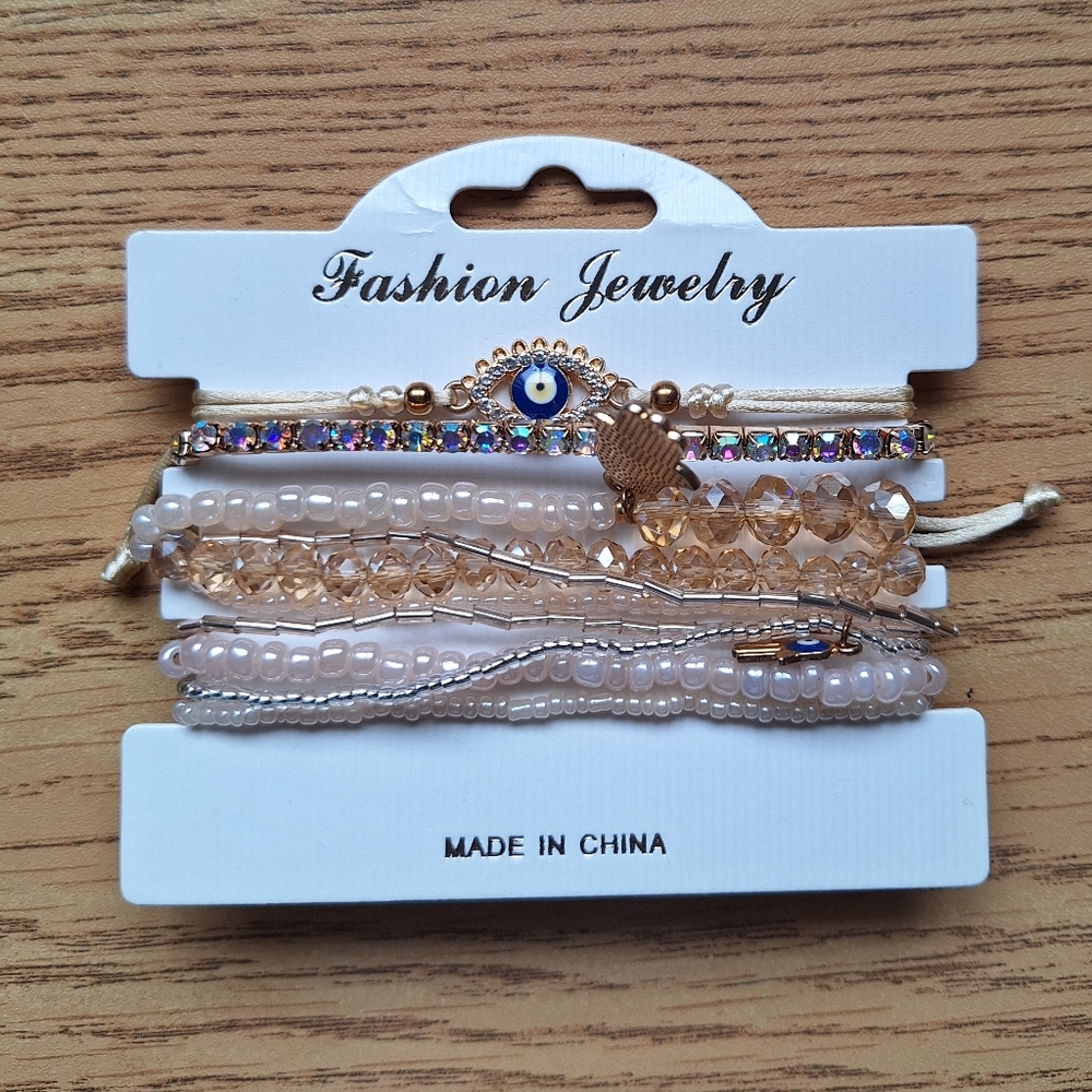 3/$20 Evil Eye Fashion Jewelry Gold and Cream Layered Stacked Bracelet Set